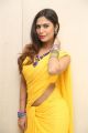 Actress Nishi Ganda Yellow Saree Hot Stills