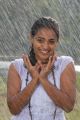 Telugu Actress Nithya Menon Wet Photos in Rain Song