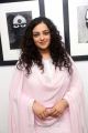 Actress Nithya Menon in Pink Churidar Photos @ Gnana Shekar Art Exhibition