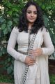 Actress Nithya Menon Photos in White Salwar Kameez