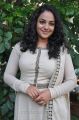 Actress Nitya Menon in White Salwar Kameez Photos