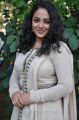 Actress Nithya Menon in White Salwar Kameez Photos