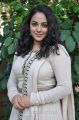 Actress Nithya Menon in White Salwar Kameez Photos