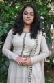 Actress Nitya Menon in White Salwar Kameez Photos