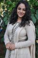 Actress Nitya Menon in White Salwar Kameez Photos