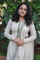 Actress Nitya Menon Photos in White Salwar Kameez