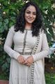 Actress Nitya Menon in White Salwar Kameez Photos