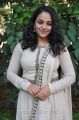 Actress Nithya Menon Photos in White Salwar Kameez