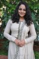 Actress Nithya Menon in White Salwar Kameez Photos