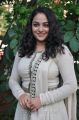 Actress Nithya Menon in White Salwar Kameez Photos