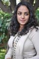 Actress Nitya Menon Photos in White Salwar Kameez