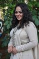 Actress Nitya Menon in White Salwar Kameez Photos