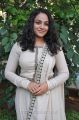 Actress Nitya Menon Photos in White Salwar Kameez