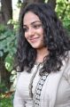 Actress Nithya Menon Photos in White Salwar Kameez