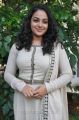 Actress Nithya Menon in White Salwar Kameez Photos