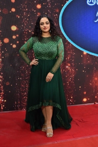 Actress Nithya Menon New Pics in Green Dress