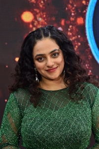 Actress Nithya Menon New Pics in Green Dress