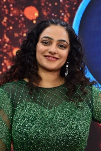 Actress Nithya Menon New Pics in Green Dress