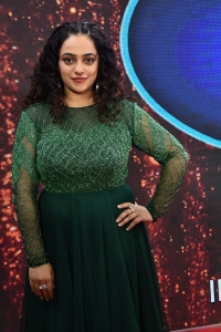 Actress Nithya Menon New Pics in Green Dress