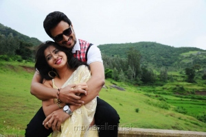 Raja, Nisha Shah in Oh My Love Telugu Movie Photos