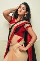 Actress Pavani Hot Stills in Black And Peach Saree