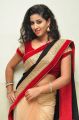 Telugu Actress Pavani Hot Stills in Black & Red Saree