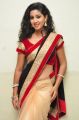 Actress Pavani Hot Stills in Black And Peach Saree