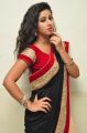 Actress Pavani Hot Stills in Black And Peach Saree