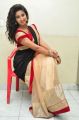 Actress Pavani Hot Stills in Black And Peach Saree