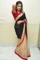 Actress Pavani Hot Stills in Black And Peach Saree