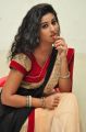 Actress Pavani Hot Stills in Black And Peach Saree