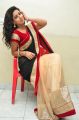 Telugu Actress Pavani Hot Stills in Black & Red Saree