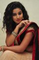 Actress Pavani Hot Stills in Black And Peach Saree