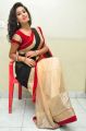 Actress Pavani Hot Stills in Black And Peach Saree