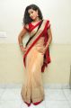 Actress Pavani Hot Stills in Black And Peach Saree