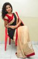 Telugu Actress Pavani Hot Stills in Black & Red Saree