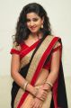 Actress Pavani Hot Stills in Black And Peach Saree