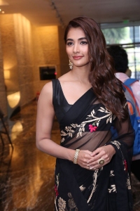 Actress Pooja Hegde Black Saree Images @ Acharya Press Meet