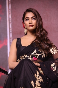 Actress Pooja Hegde Black Saree Images @ Acharya Press Meet