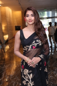 Actress Pooja Hegde Black Saree Images @ Acharya Press Meet