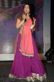 Charmi @ Potugadu Audio Launch Photos