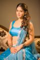 Actress Priyanka Jawalkar Hot in Blue Saree Photoshoot Stills