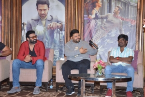 Prabhas, S.Thaman, Justin Prabhakaran @ Radhe Shyam Movie Press Meet Stills