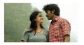 Keerthy Suresh, Dhanush in Rail Telugu Movie Stills.