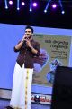 Hero Ram Charan Images in Dark Brown Shirt & White Dhoti