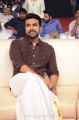 Actor Ram Charan Images in Dark Brown Shirt & White Veshti