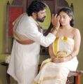 Santhosh Sivan, Nithya Menon in Ravi Varma Movie Hot Stills