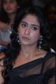 Regina Cassandra posing in Hot Black Saree at Ra Ra Krishnayya Audio Release