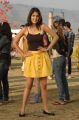 Actress Ria Chakravarthi in Brown Sleeveless Top & Yellow Skirt