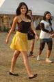 Actress Riya Chakravarthi in Brown Sleeveless Top & Yellow Skirt